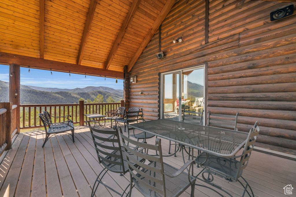 Wooden deck featuring a mountain view