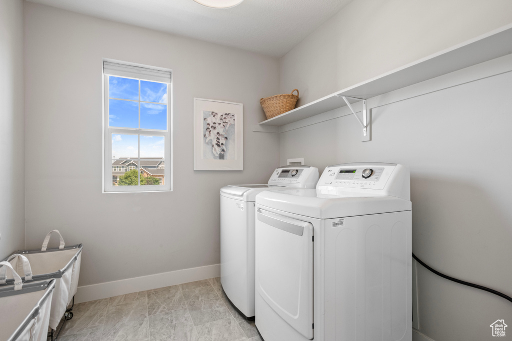 Clothes washing area with washer and dryer