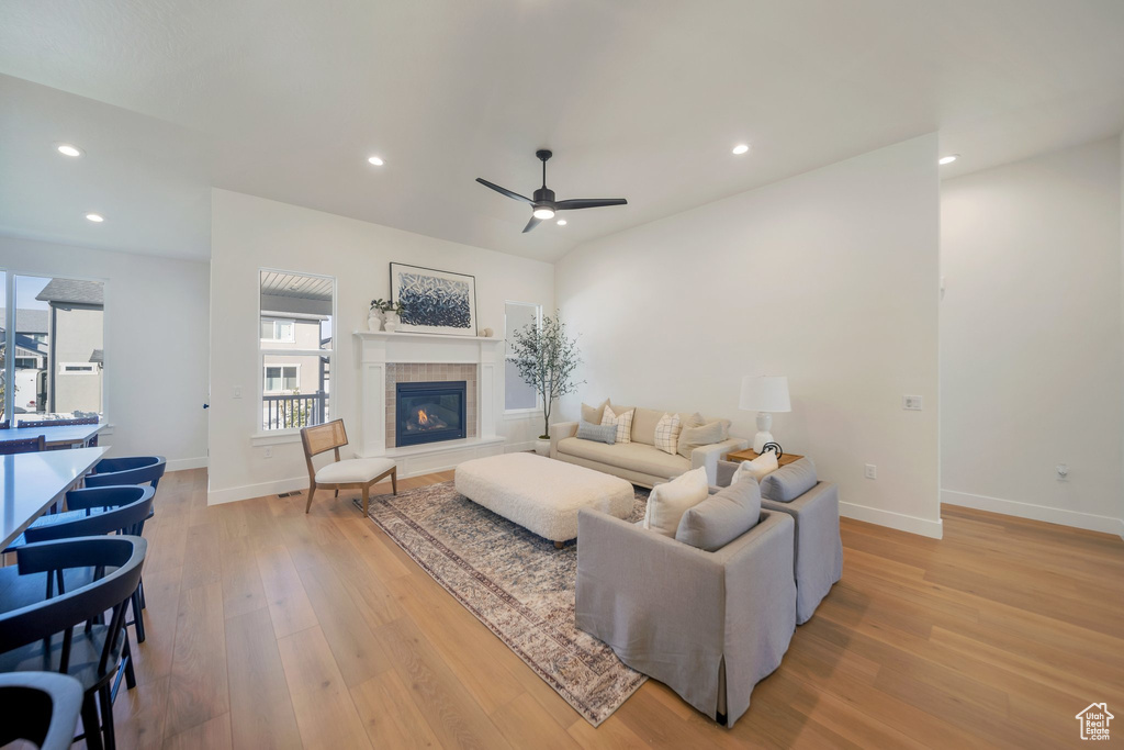 Living room featuring light hardwood / wood-style flooring and ceiling fan