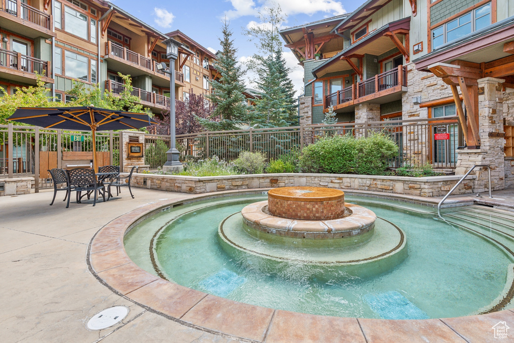 View of swimming pool with a patio