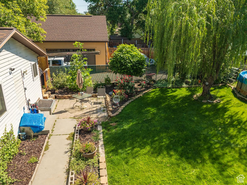 View of yard with a patio area