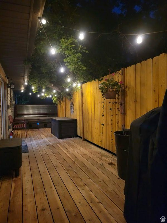 View of deck at night