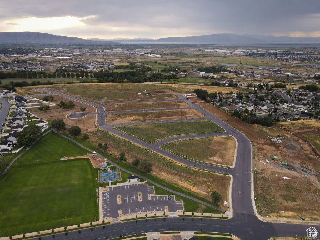 Aerial view at dusk featuring a mountain view