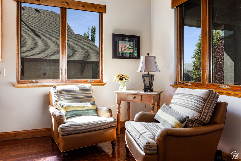 Sitting room featuring dark hardwood / wood-style floors