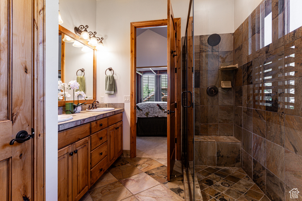 Bathroom with vanity and walk in shower