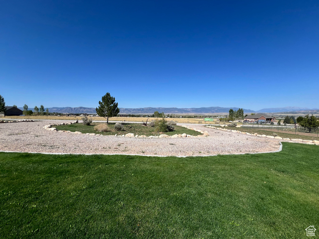 View of yard with a mountain view