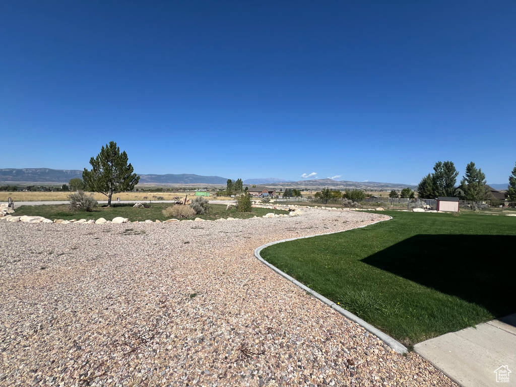 View of yard with a mountain view