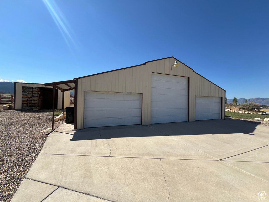 Garage featuring a mountain view