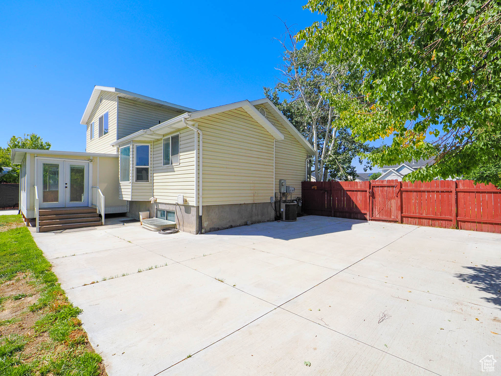 Back of house with a patio area