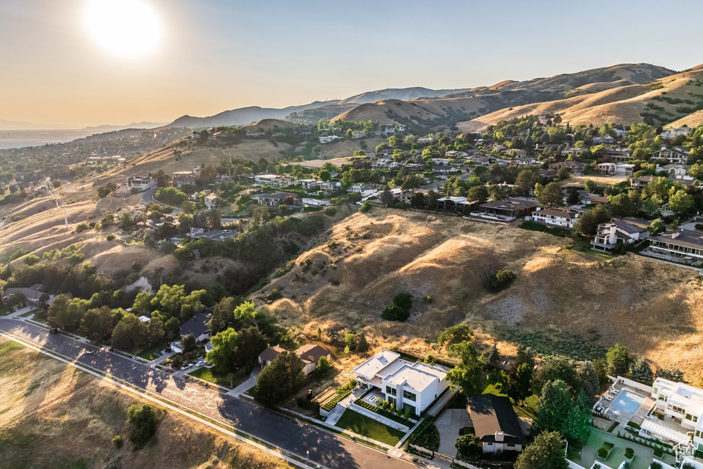 Aerial view at dusk featuring a mountain view