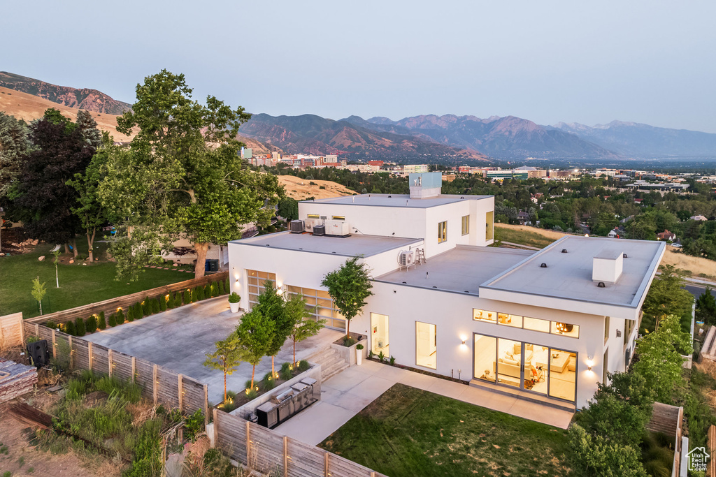 Birds eye view of property with a mountain view