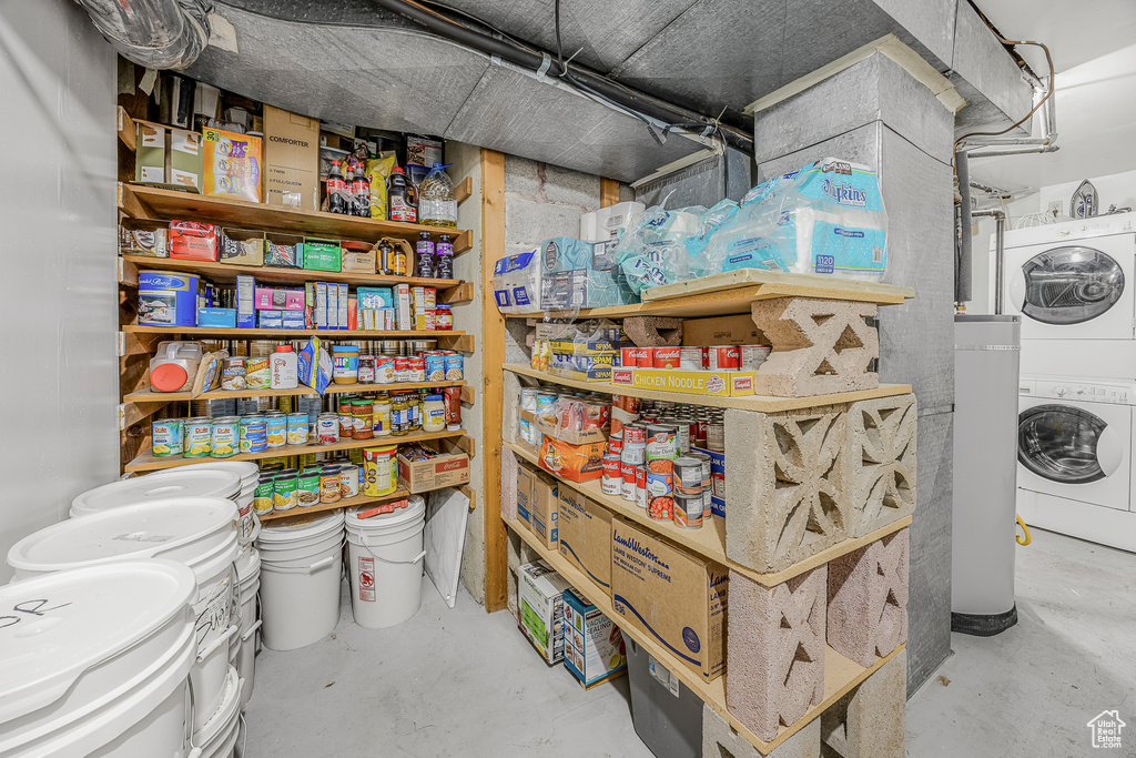 Storage room with stacked washer and dryer