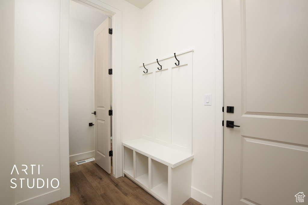 Mudroom featuring dark hardwood / wood-style flooring