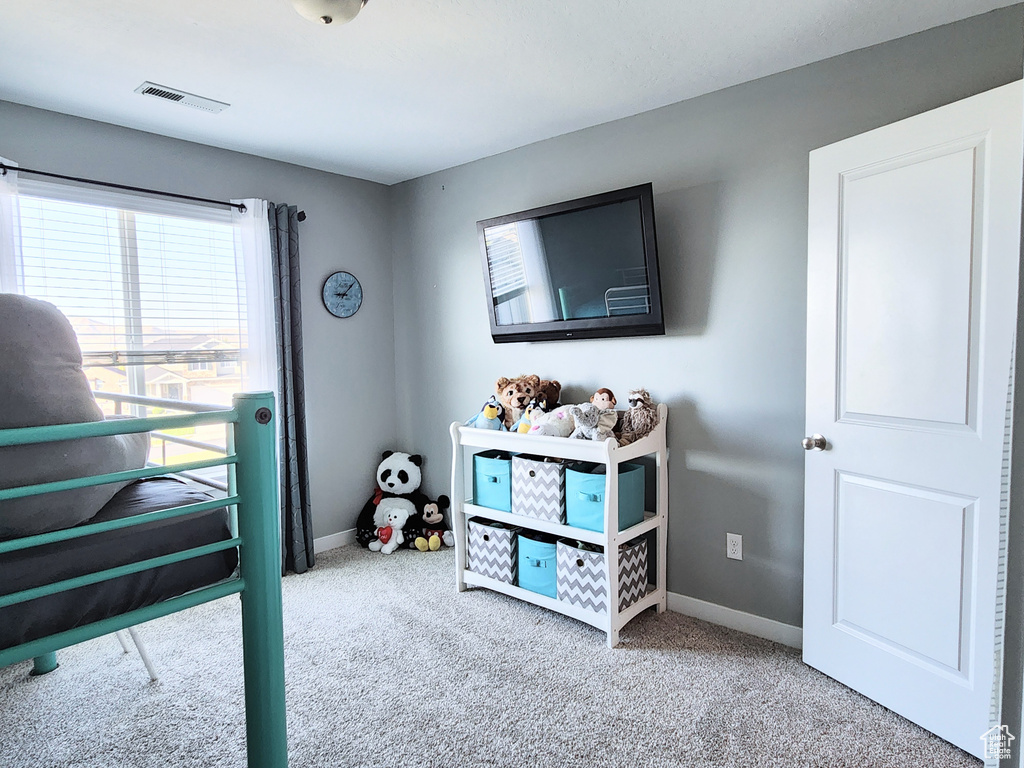 View of carpeted bedroom