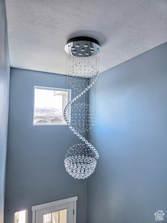 Room details featuring a textured ceiling