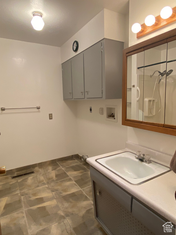 Bathroom with a shower and vanity