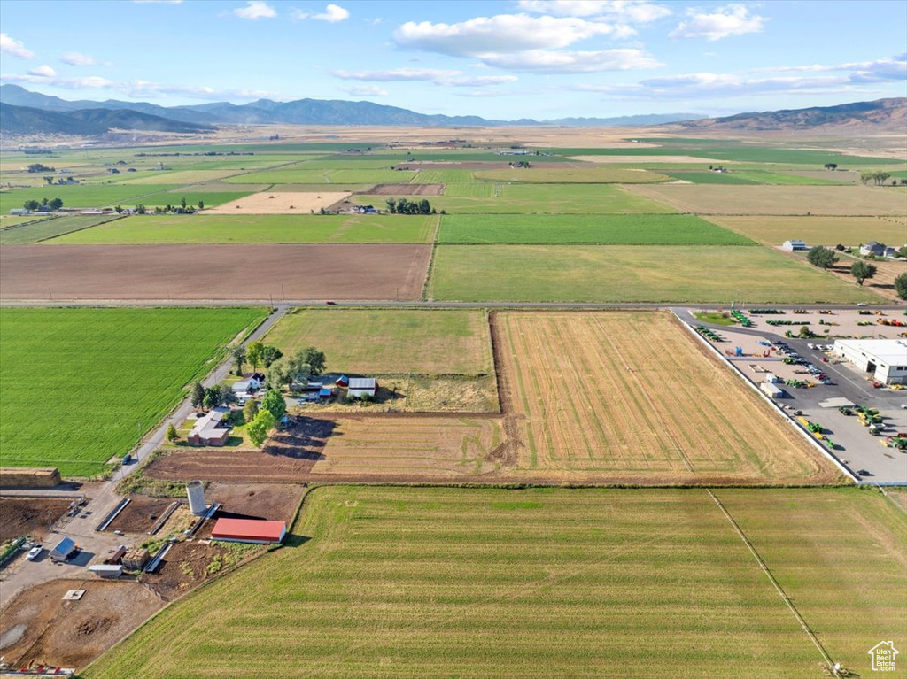 Drone / aerial view with a mountain view and a rural view
