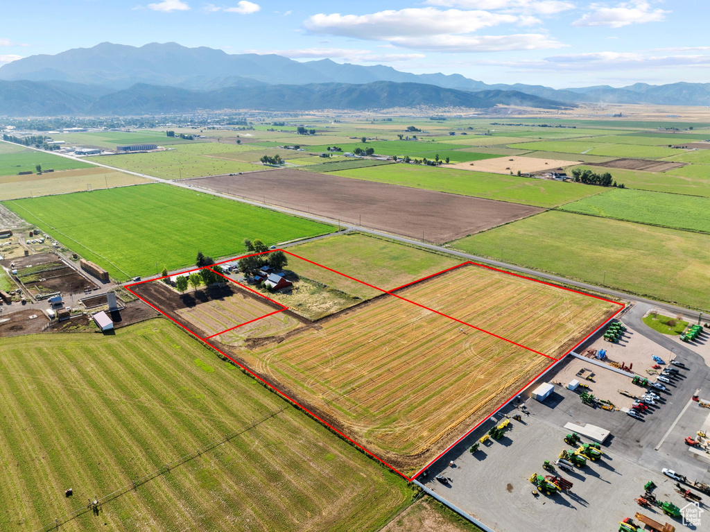 Drone / aerial view with a mountain view and a rural view