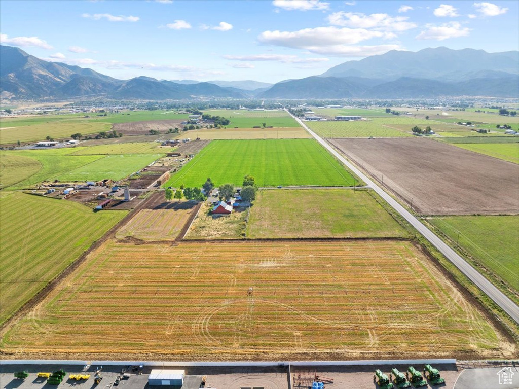 Drone / aerial view with a mountain view and a rural view