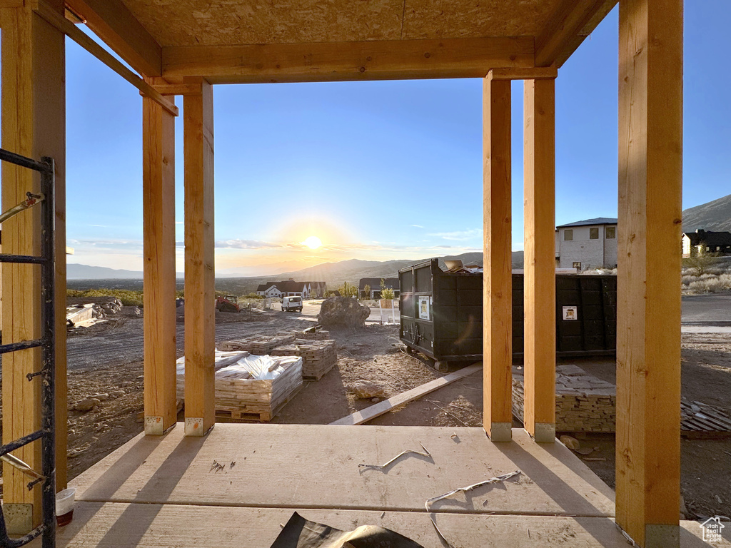 Patio terrace at dusk with a mountain view