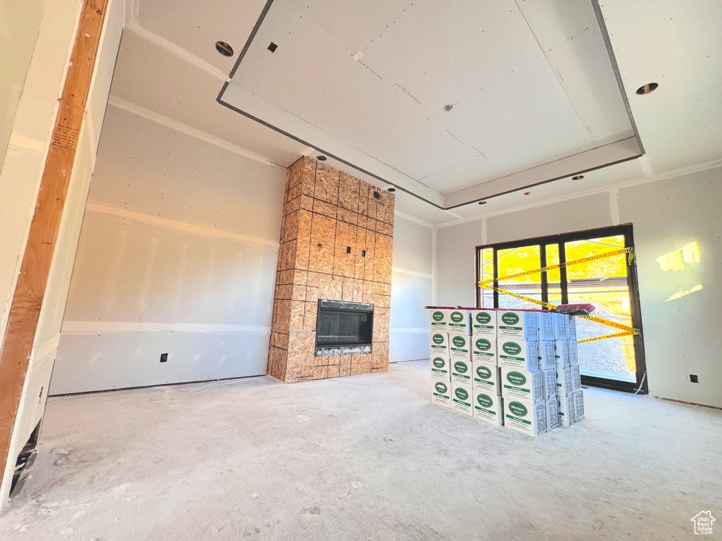 Unfurnished living room featuring a fireplace