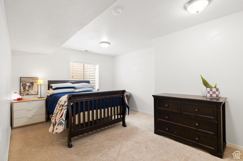 View of carpeted bedroom