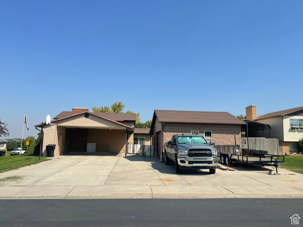 View of front of home featuring a carport