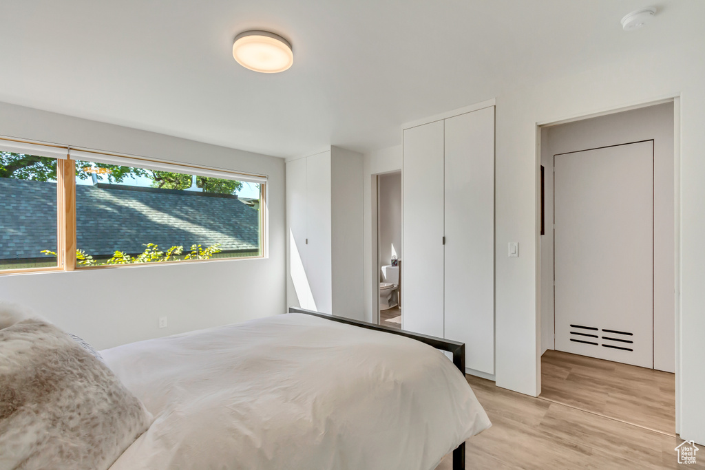 Bedroom with light wood-type flooring