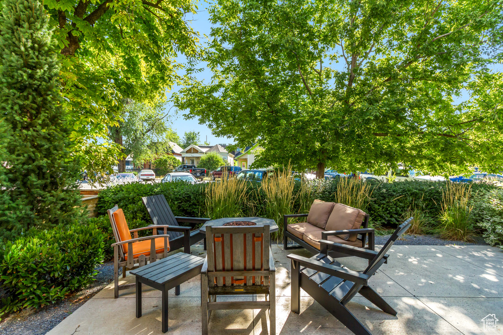 View of patio / terrace featuring an outdoor fire pit