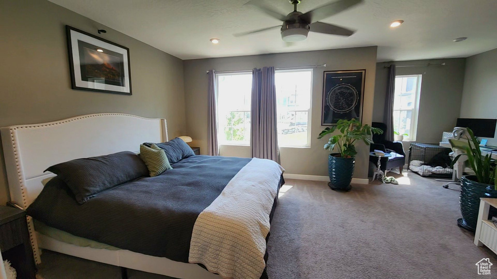 Bedroom featuring carpet flooring and ceiling fan