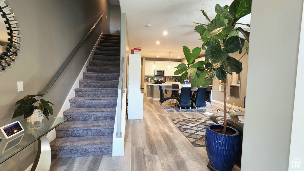 Stairs with wood-type flooring