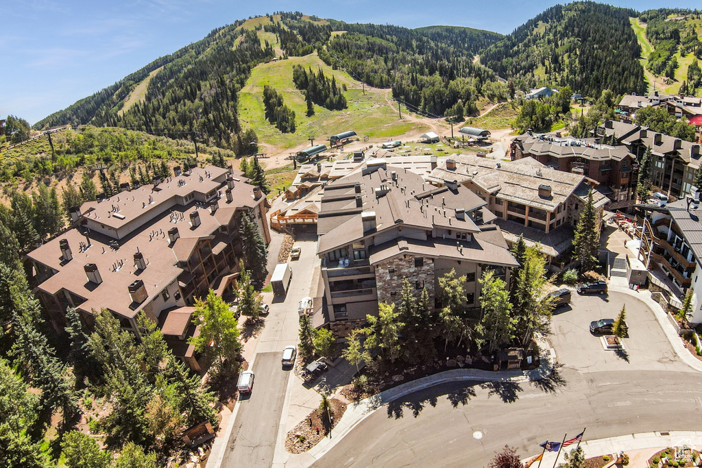 Birds eye view of property with a mountain view