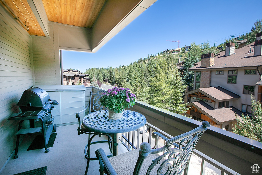 Balcony featuring area for grilling