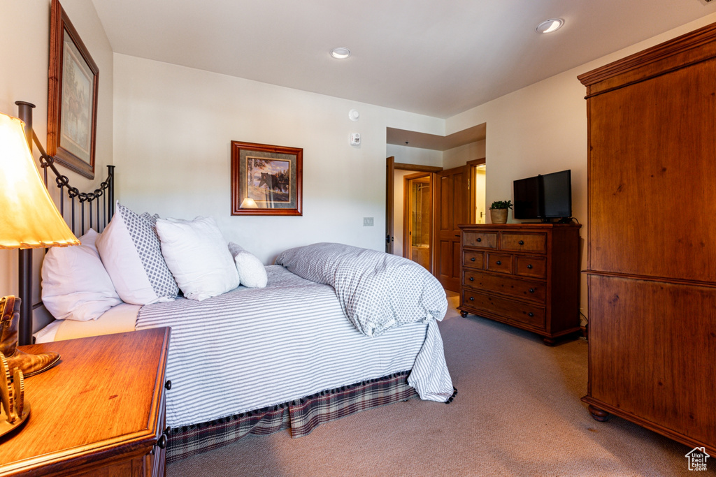 Bedroom featuring carpet floors