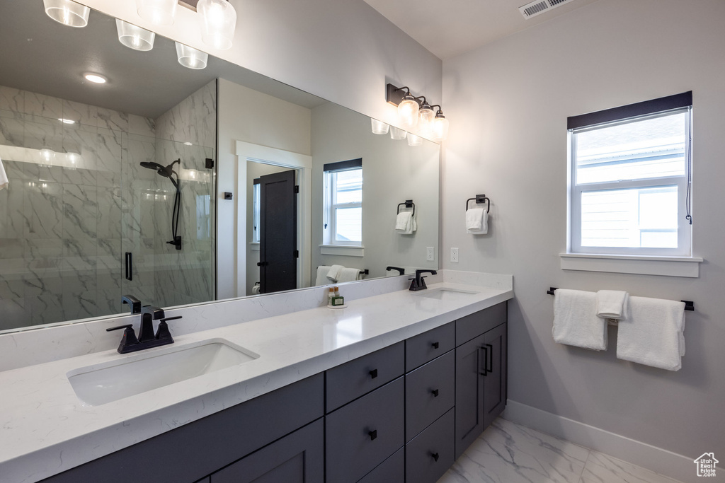 Bathroom with vanity and walk in shower