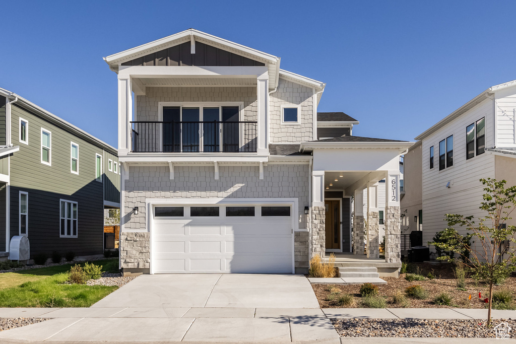 Craftsman inspired home featuring a garage