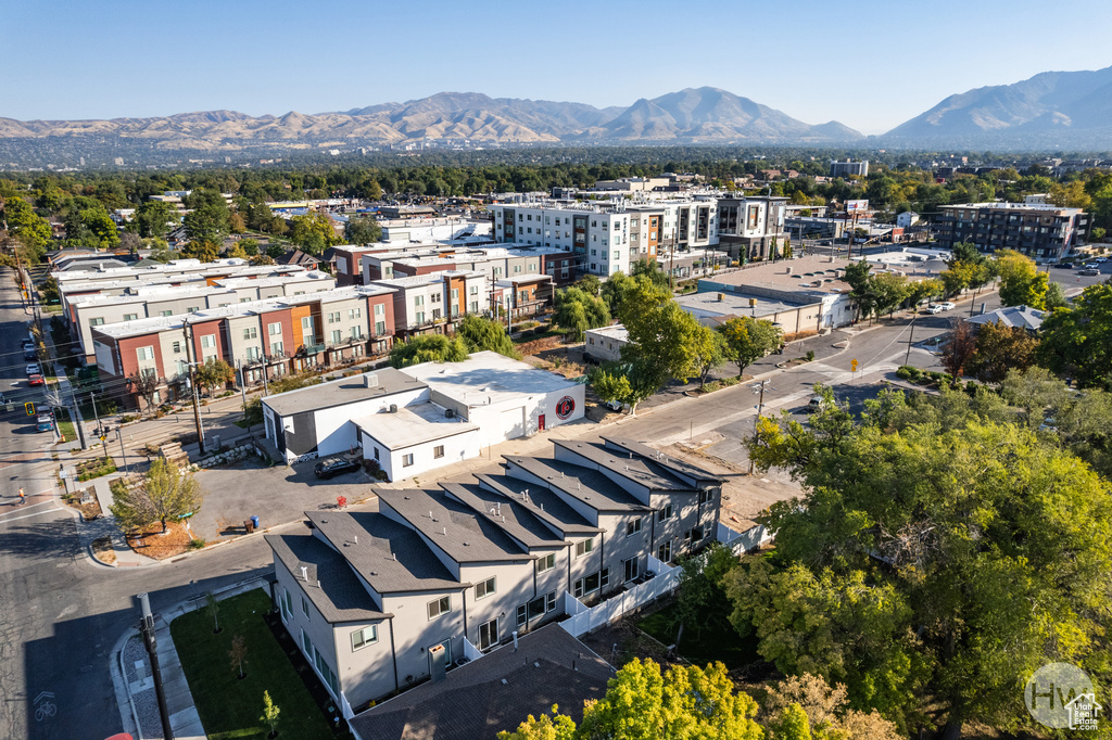 Birds eye view of property with a mountain view