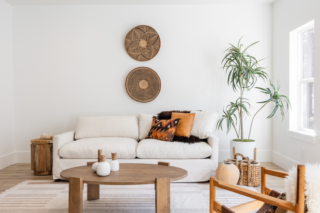 Living area with light hardwood / wood-style floors