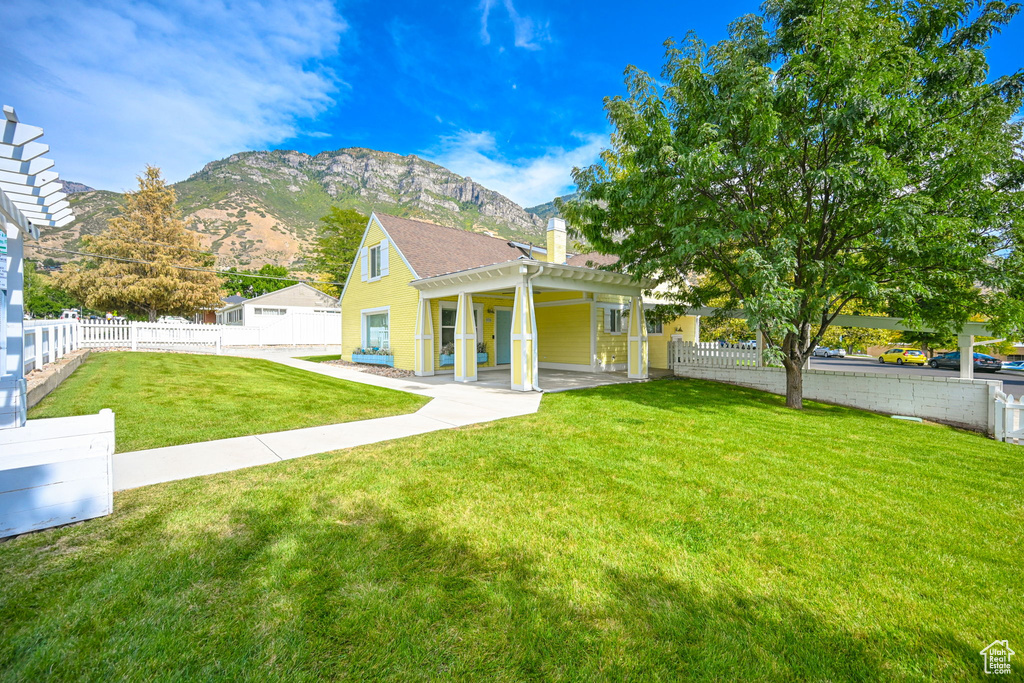 Exterior space featuring a mountain view