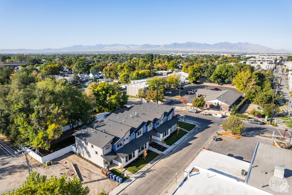 Birds eye view of property with a mountain view