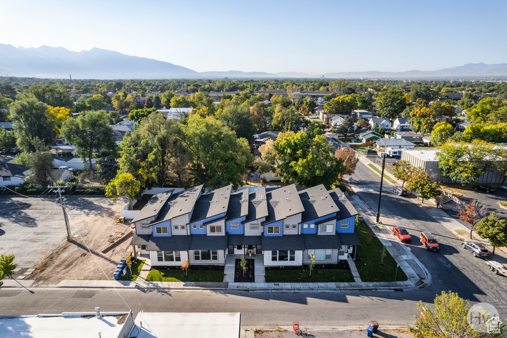 Birds eye view of property with a mountain view