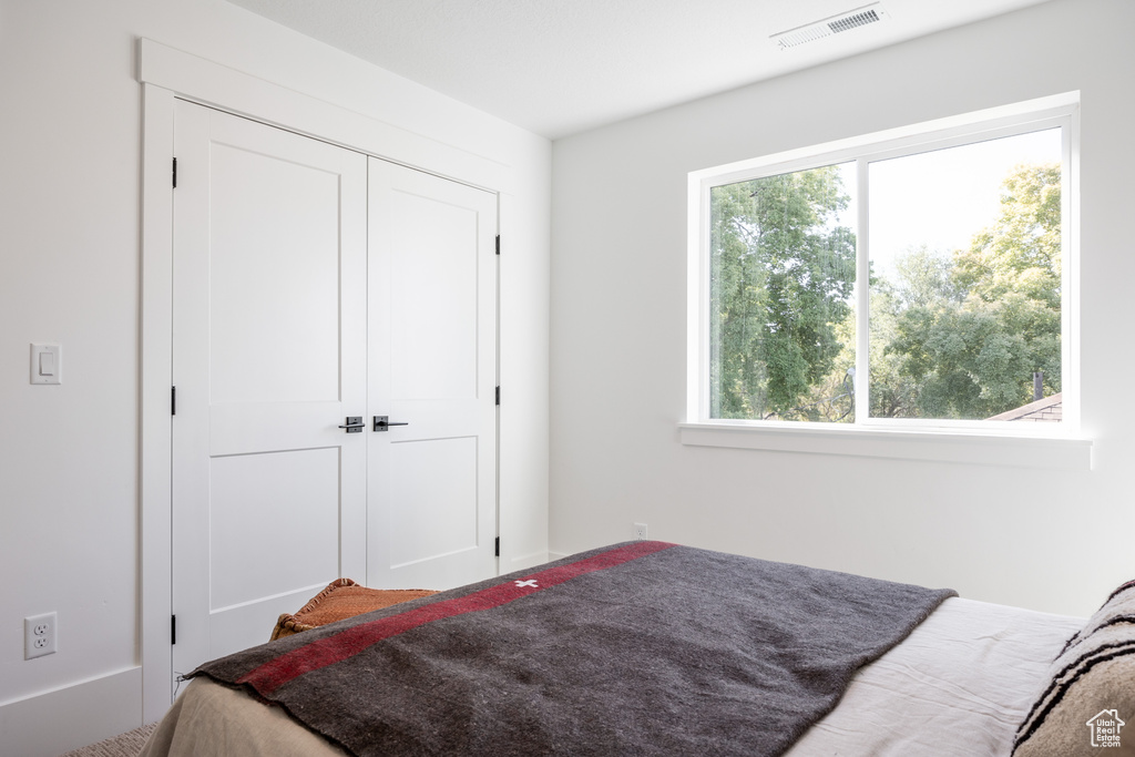 Bedroom featuring a closet