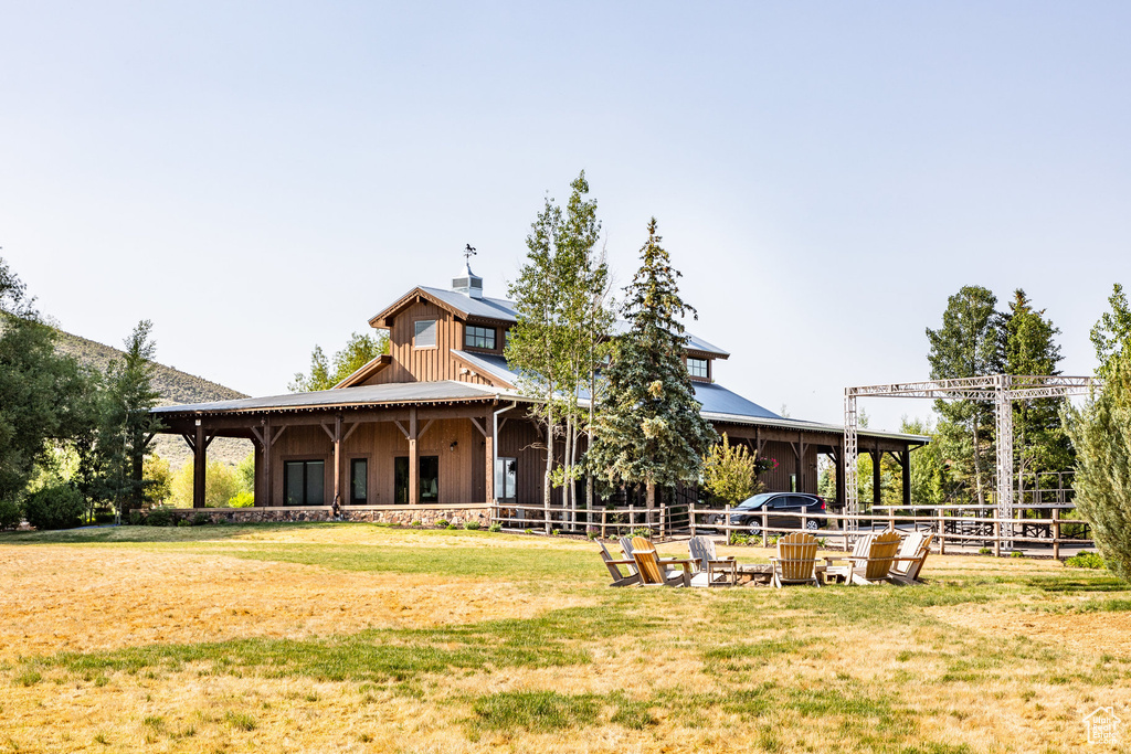 Back of property featuring board and batten siding