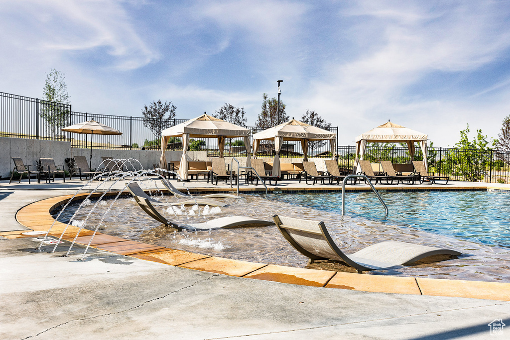 Community pool featuring a gazebo