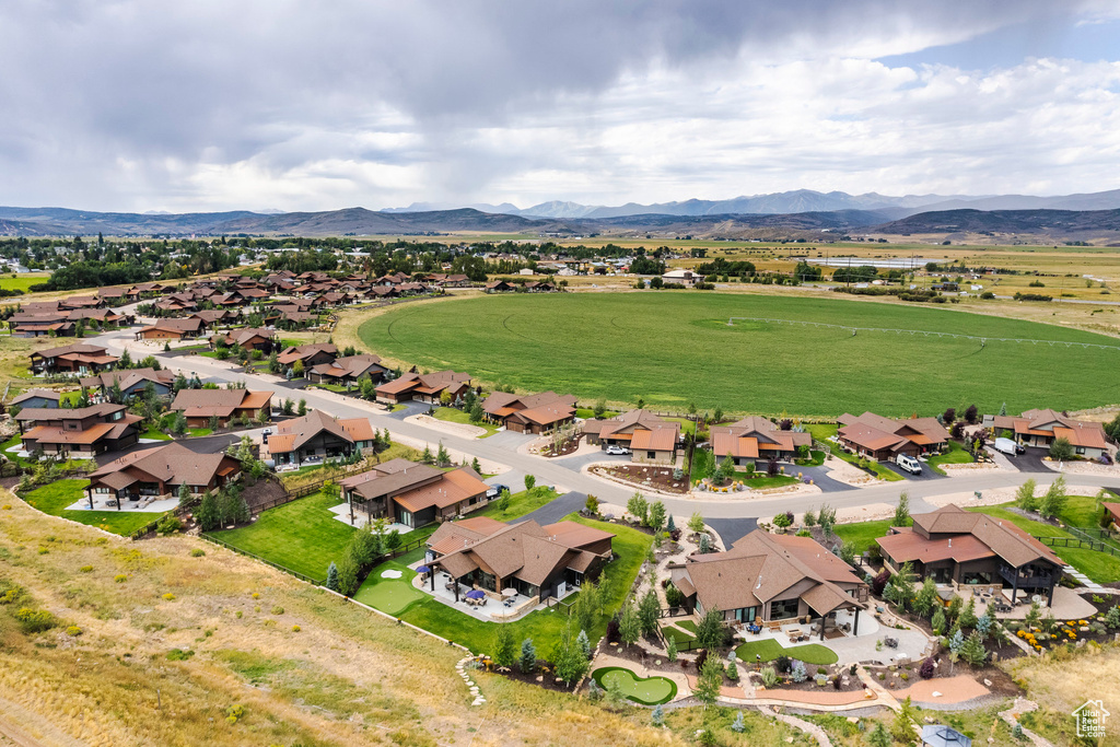 Aerial view of property's location with nearby suburban area