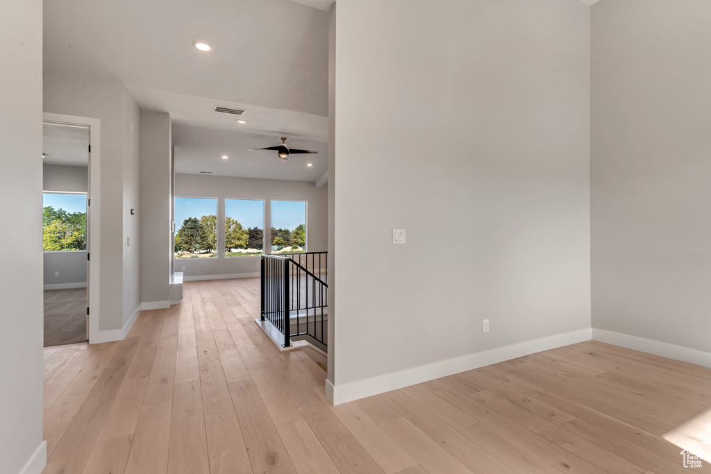 Hallway featuring light hardwood / wood-style flooring