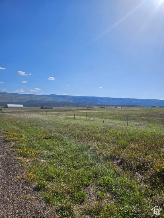 Exterior space with a rural view and a mountain view