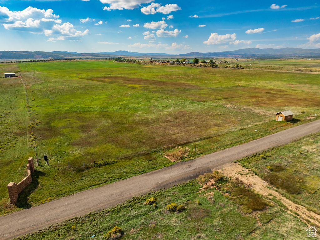 Drone / aerial view featuring a mountain view and a rural view