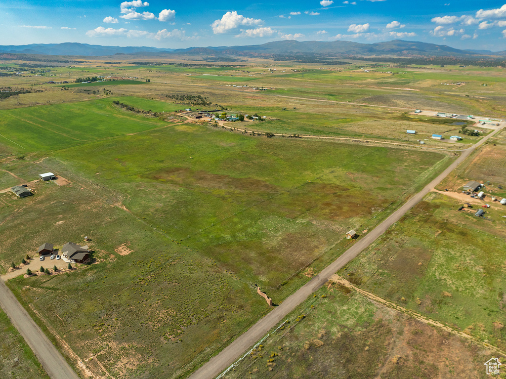 Drone / aerial view featuring a mountain view and a rural view