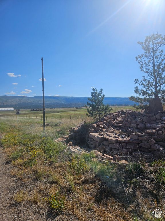 Property view of mountains featuring a rural view